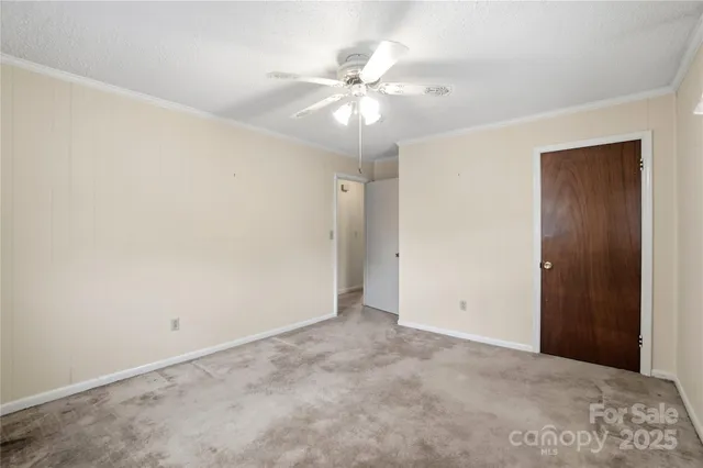 a bathroom with a double vanity sink mirror and toilet