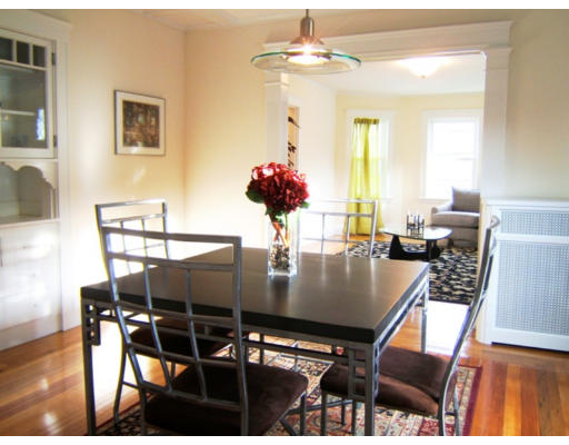 31 Nikisch Avenue, Unit 2 Boston, MA 02131 - Photo 1 of 1 a view of a dining room with furniture and wooden floor