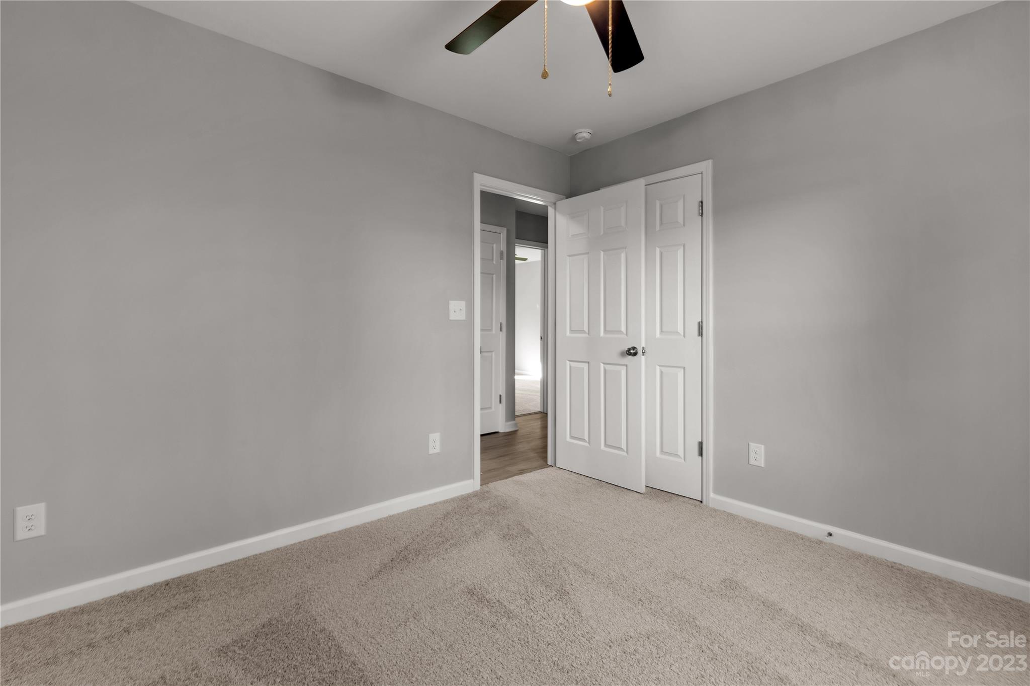 1191 Legion Road Hickory Grove, SC 29717 - Photo 21 of 32 an empty room with ceiling fan and window