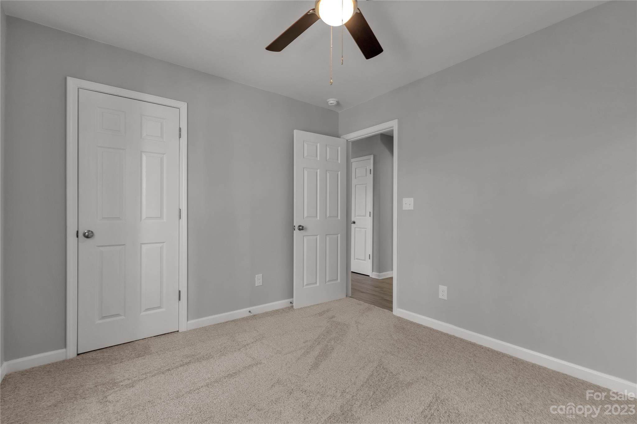 1191 Legion Road Hickory Grove, SC 29717 - Photo 23 of 32 an empty room with chandelier fan