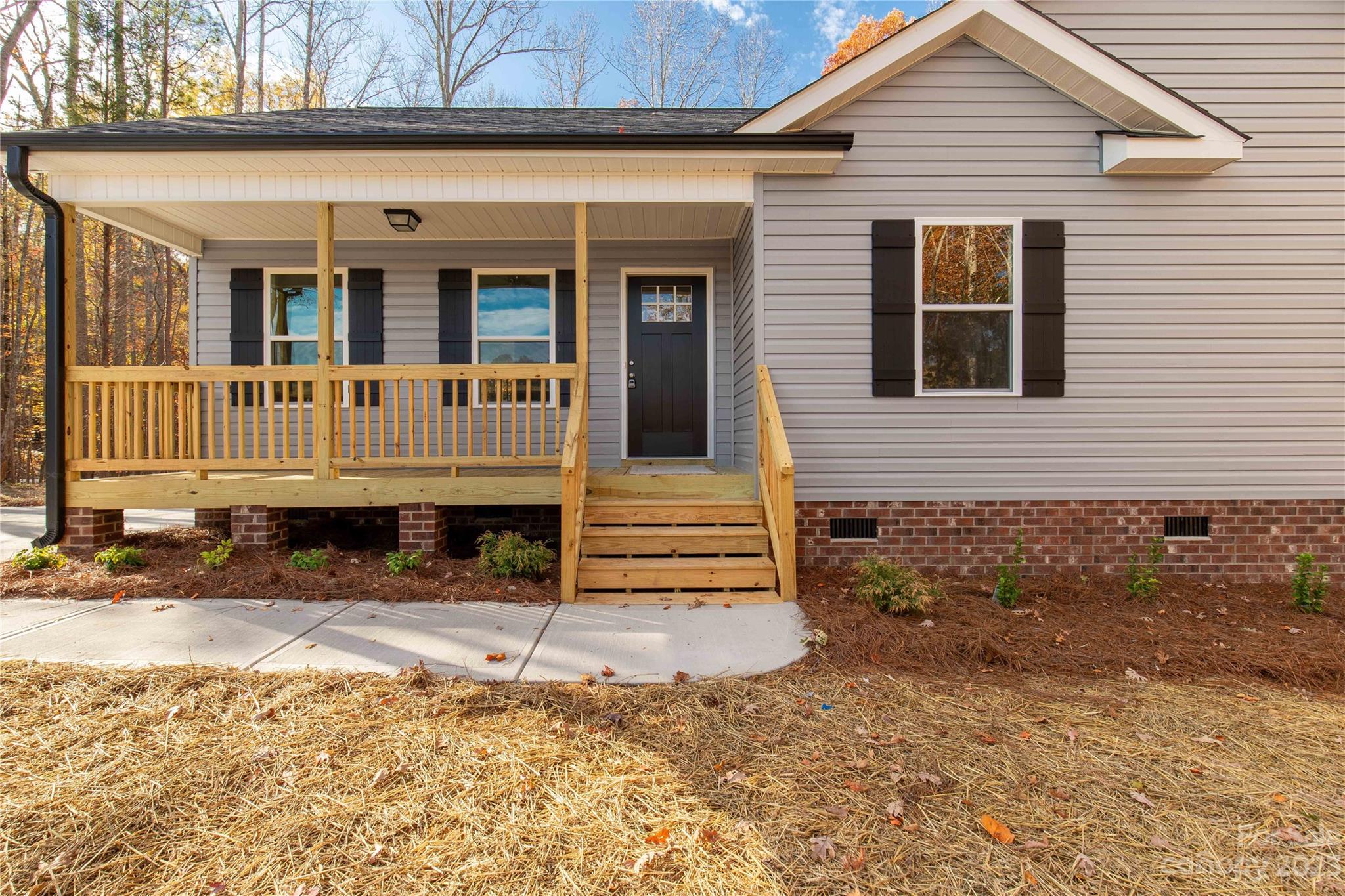 1191 Legion Road Hickory Grove, SC 29717 - Photo 4 of 32 a front view of a house with a yard
