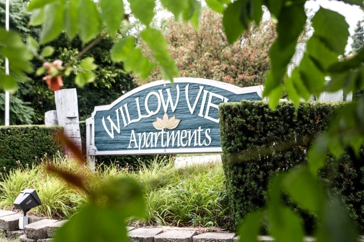 a view of a sign in a garden
