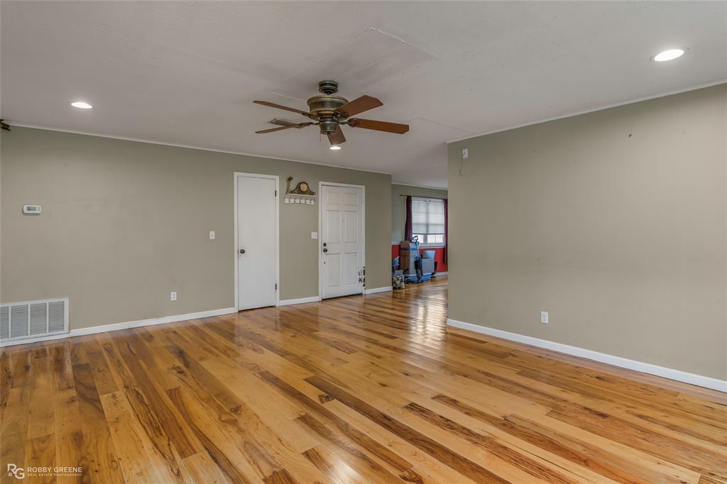 158 Edwards Road Doyline, LA 71023 - Photo 12 of 28 a view of livingroom with hardwood floor and a ceiling fan