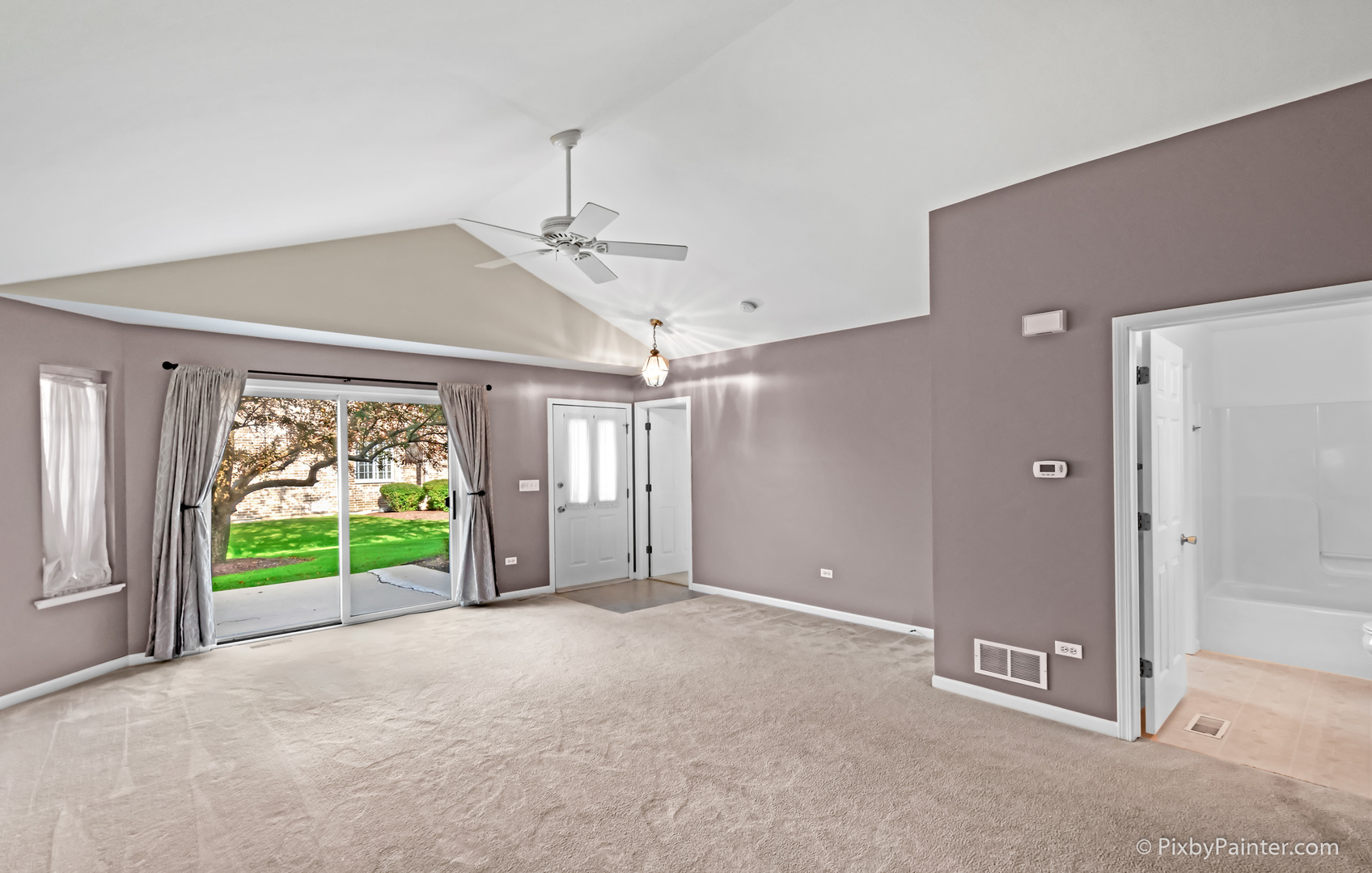 5714 Fieldstone Trail McHenry, IL 60050 - Photo 14 of 28 a view of a room with window ceiling fan and windows