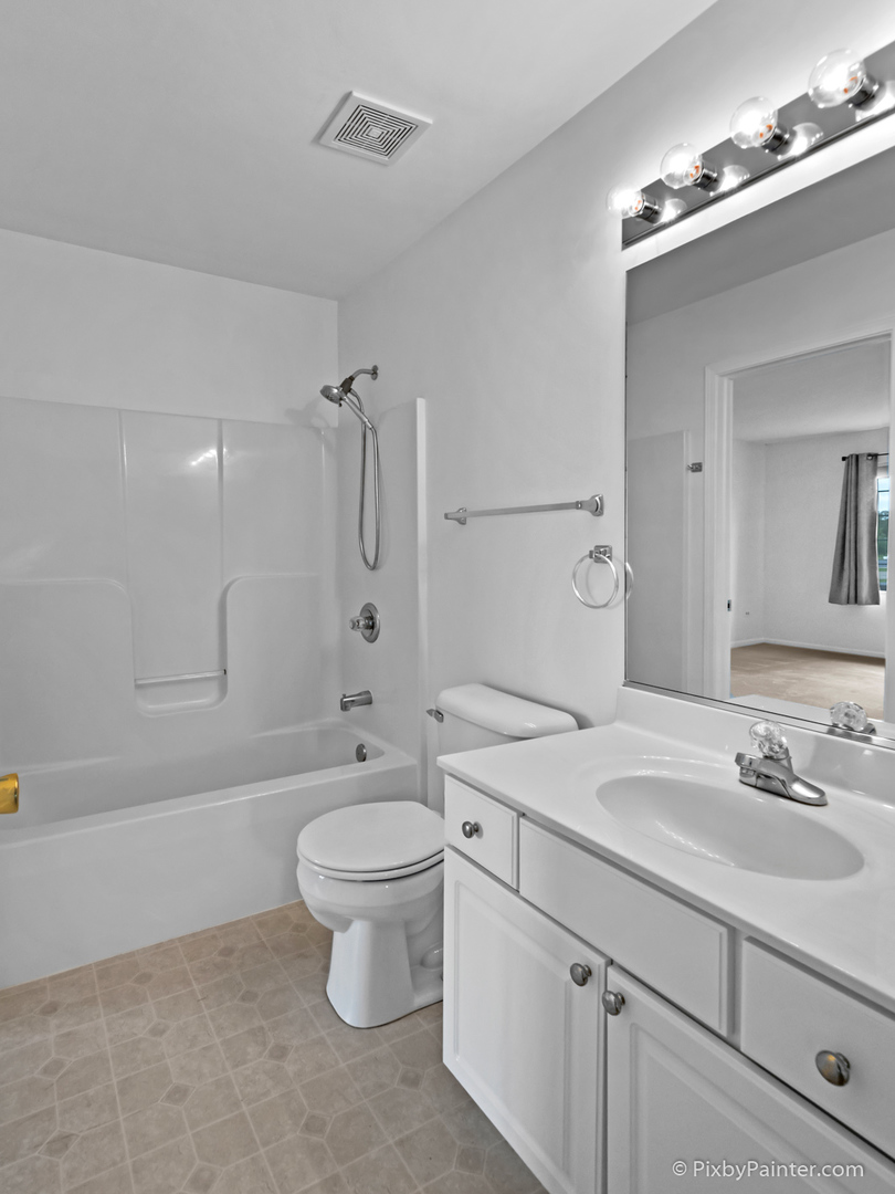 5714 Fieldstone Trail McHenry, IL 60050 - Photo 15 of 28 a bathroom with a sink a toilet and shower