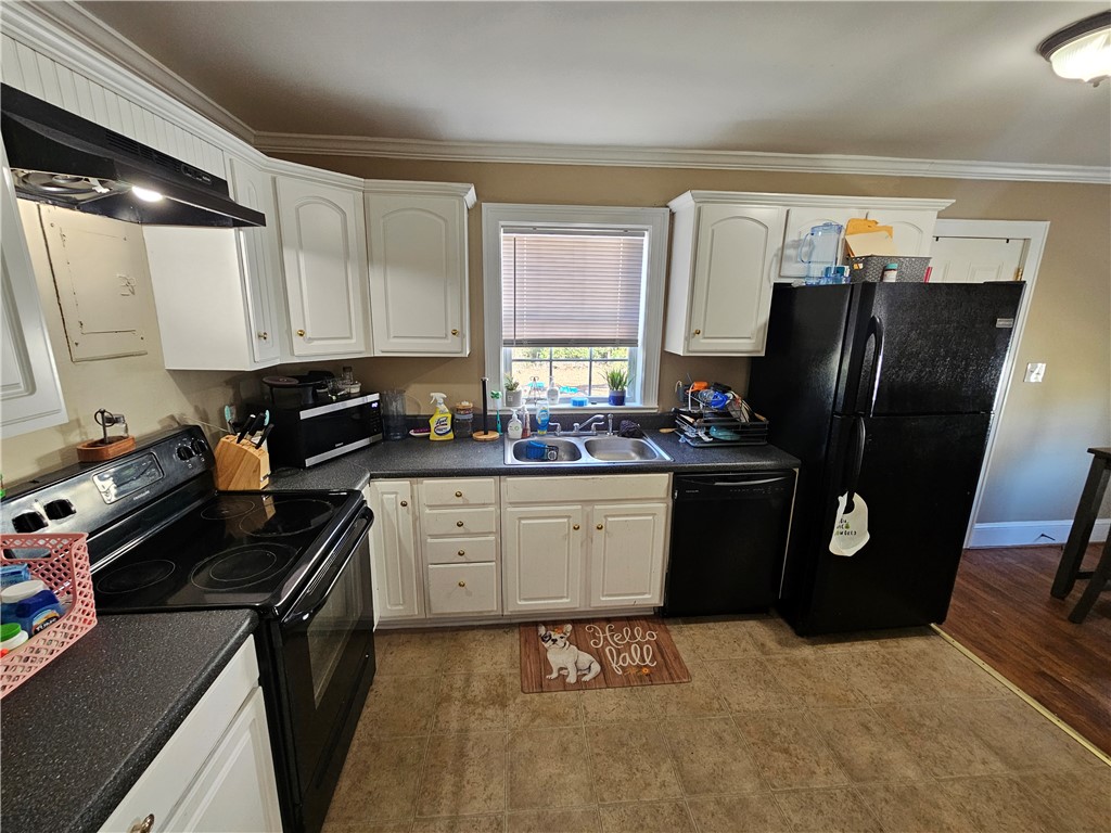 237 Pine Lane Anderson, SC 29621 - Photo 13 of 23 This bright kitchen features ample counter space and appliances, perfect for daily living.