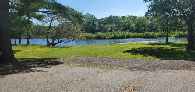 a view of a golf course with a lake