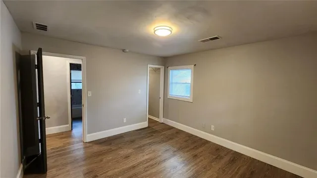 a kitchen with a sink and a stove top oven