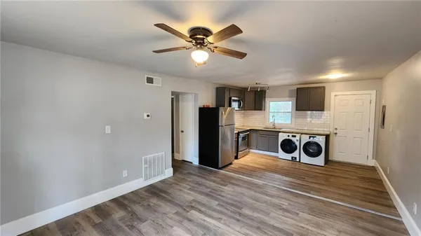 a view of an empty room and window