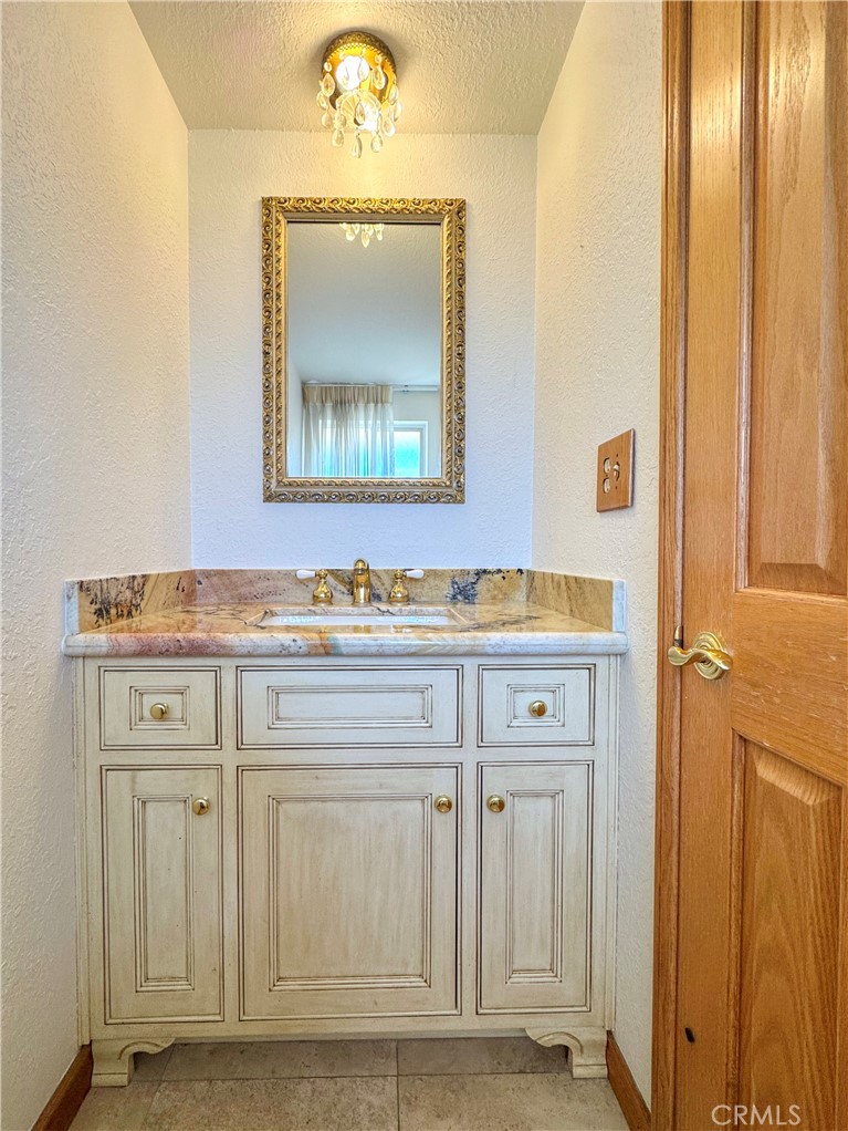 2821 Colt Road Rancho Palos Verdes, CA 90275 - Photo 16 of 42 a bathroom with a sink and a mirror