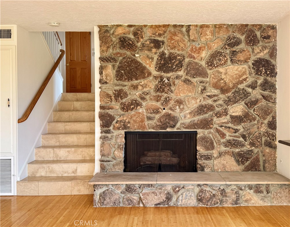 2821 Colt Road Rancho Palos Verdes, CA 90275 - Photo 26 of 42 a view of a fireplace with wooden floor