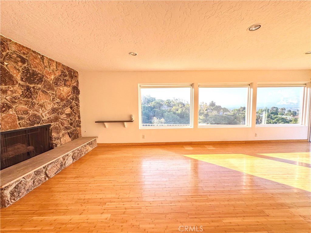 2821 Colt Road Rancho Palos Verdes, CA 90275 - Photo 27 of 42 a view of empty room with wooden floor and fan