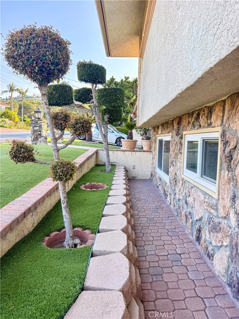 2821 Colt Road Rancho Palos Verdes, CA 90275 - Photo 41 of 42 a front view of a house with a yard