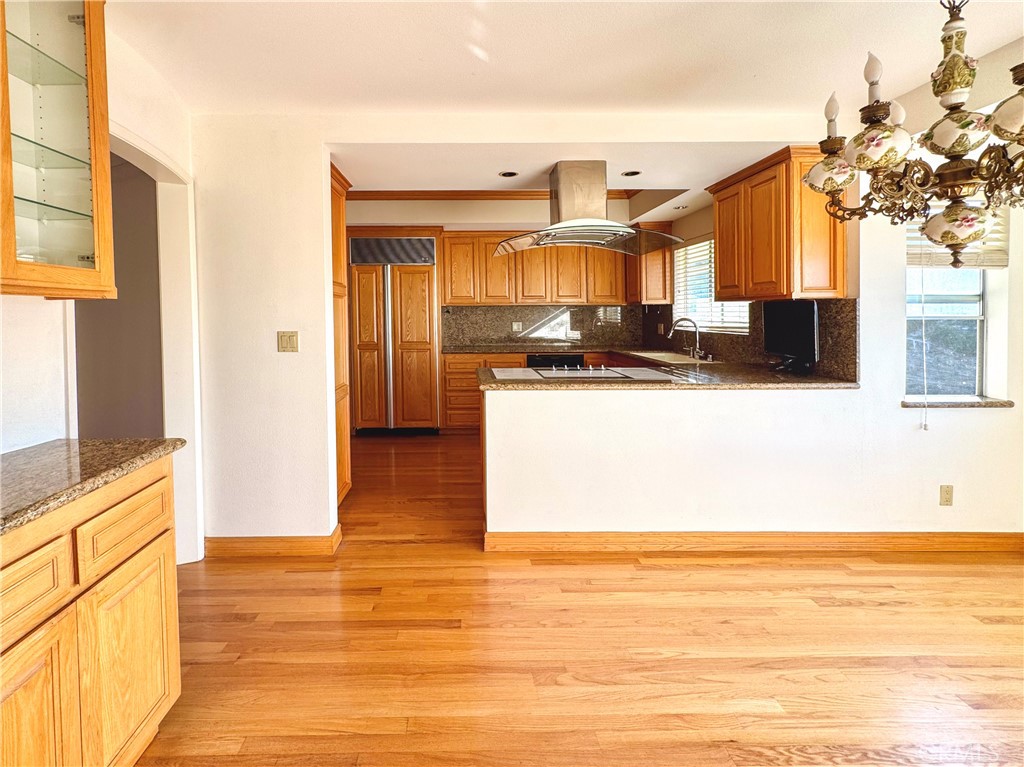 2821 Colt Road Rancho Palos Verdes, CA 90275 - Photo 7 of 42 a kitchen with stainless steel appliances kitchen island granite countertop a sink and cabinets