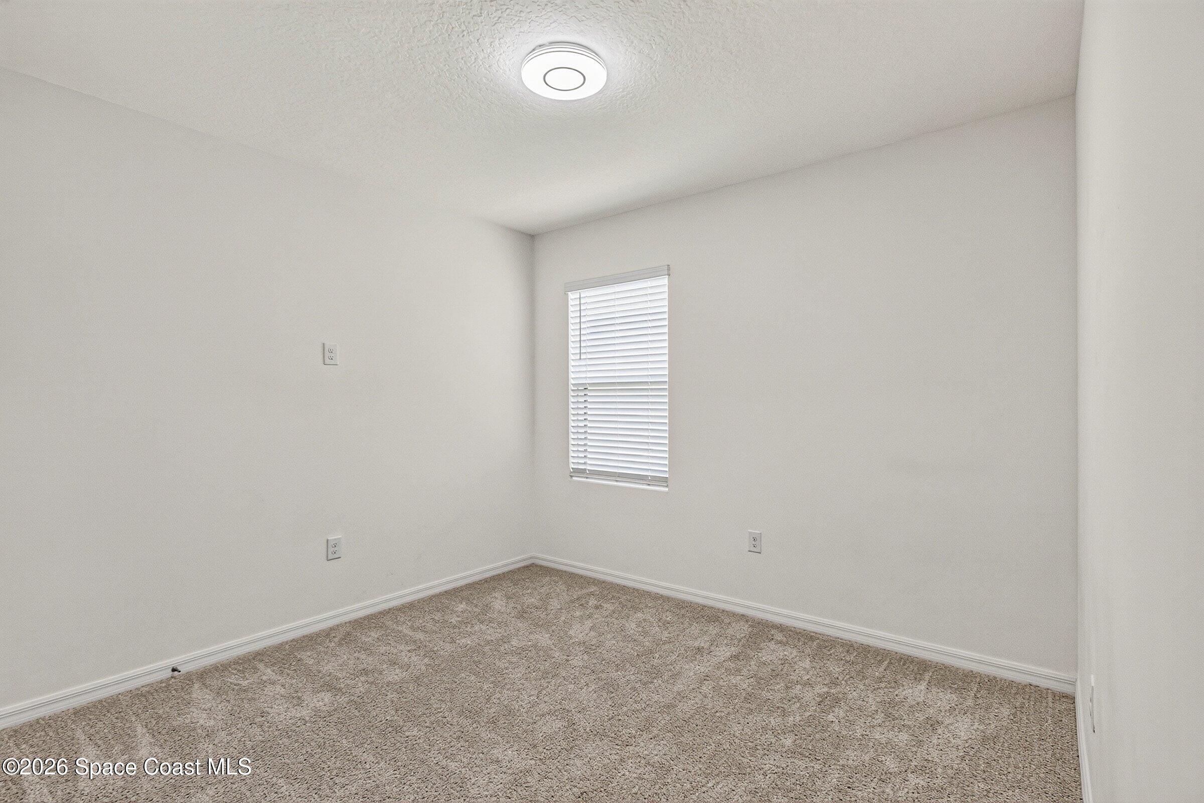 3419 Foggy Mist Road Southeast Palm Bay, FL 32909 - Photo 13 of 39 Bedroom 3