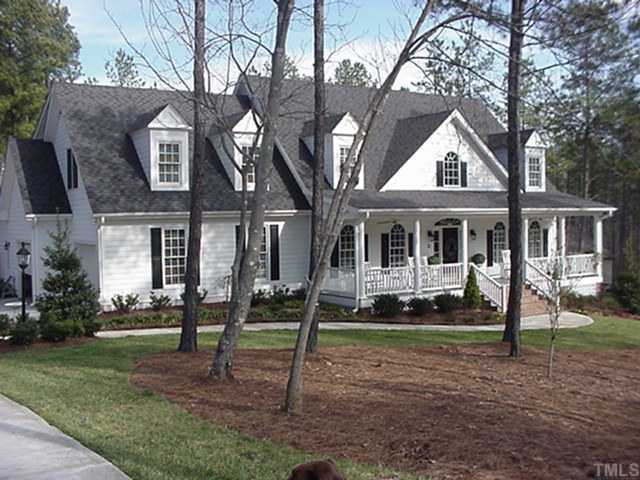 5308 Cosmos Court Raleigh, NC 27613 - Photo 1 of 1 a front view of a house with a yard