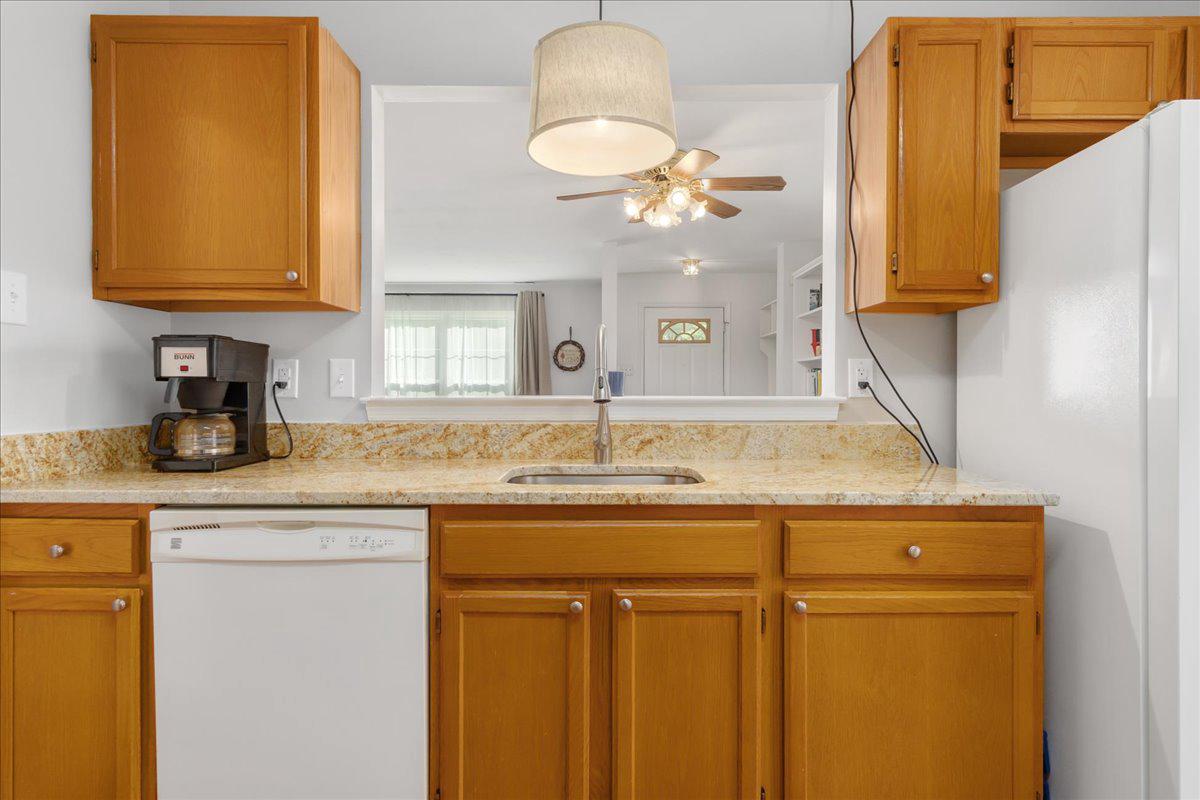 2610 Warren Way, Unit 37 Frederick, MD 21701 - Photo 15 of 42 a bathroom with a granite countertop sink and a mirror