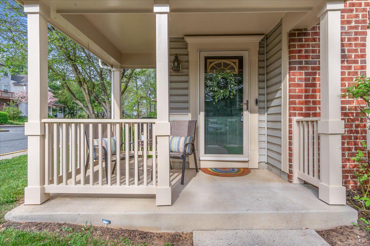 2610 Warren Way, Unit 37 Frederick, MD 21701 - Photo 2 of 42 a view of a house with a small yard and wooden floor and fence