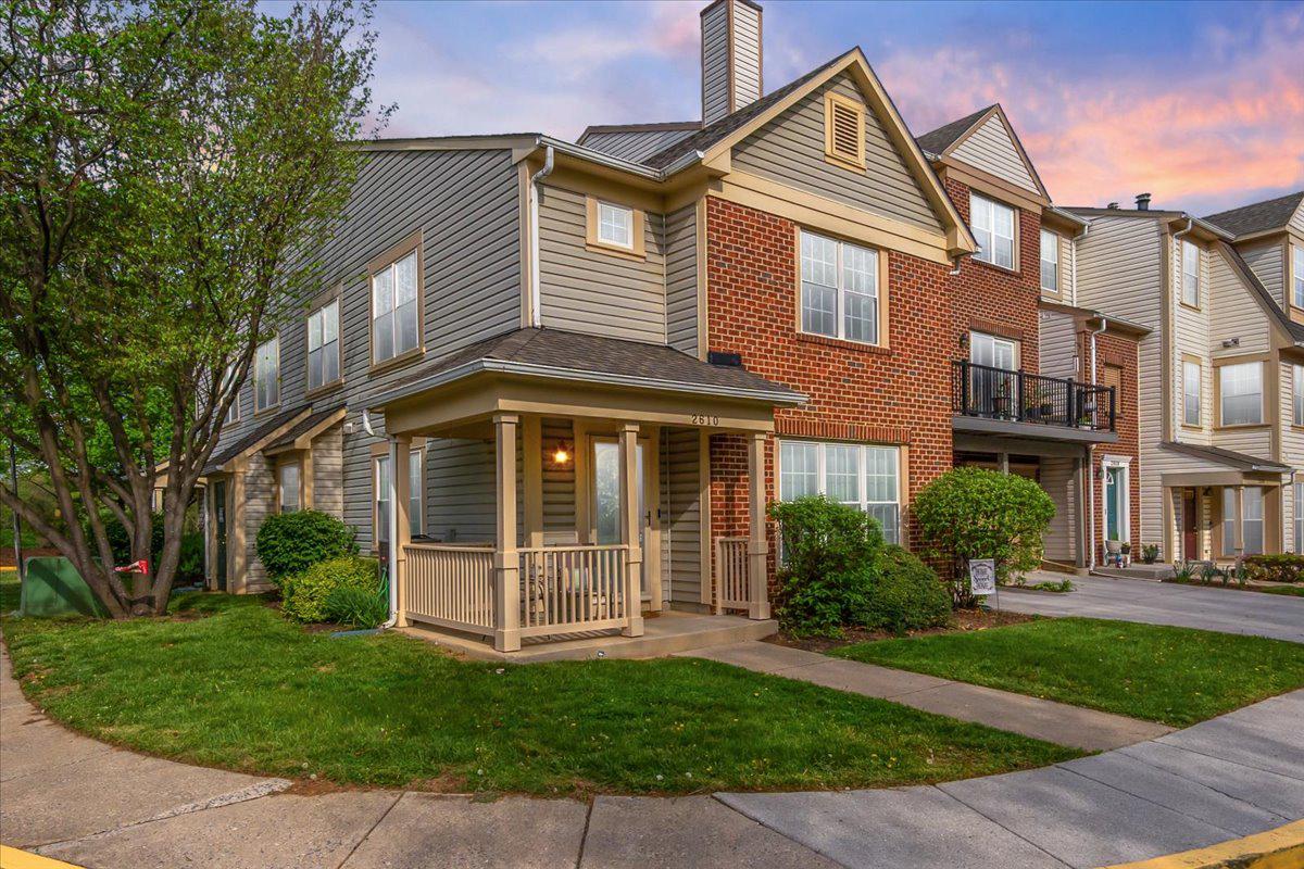 2610 Warren Way, Unit 37 Frederick, MD 21701 - Photo 3 of 42 front view of a house with a yard