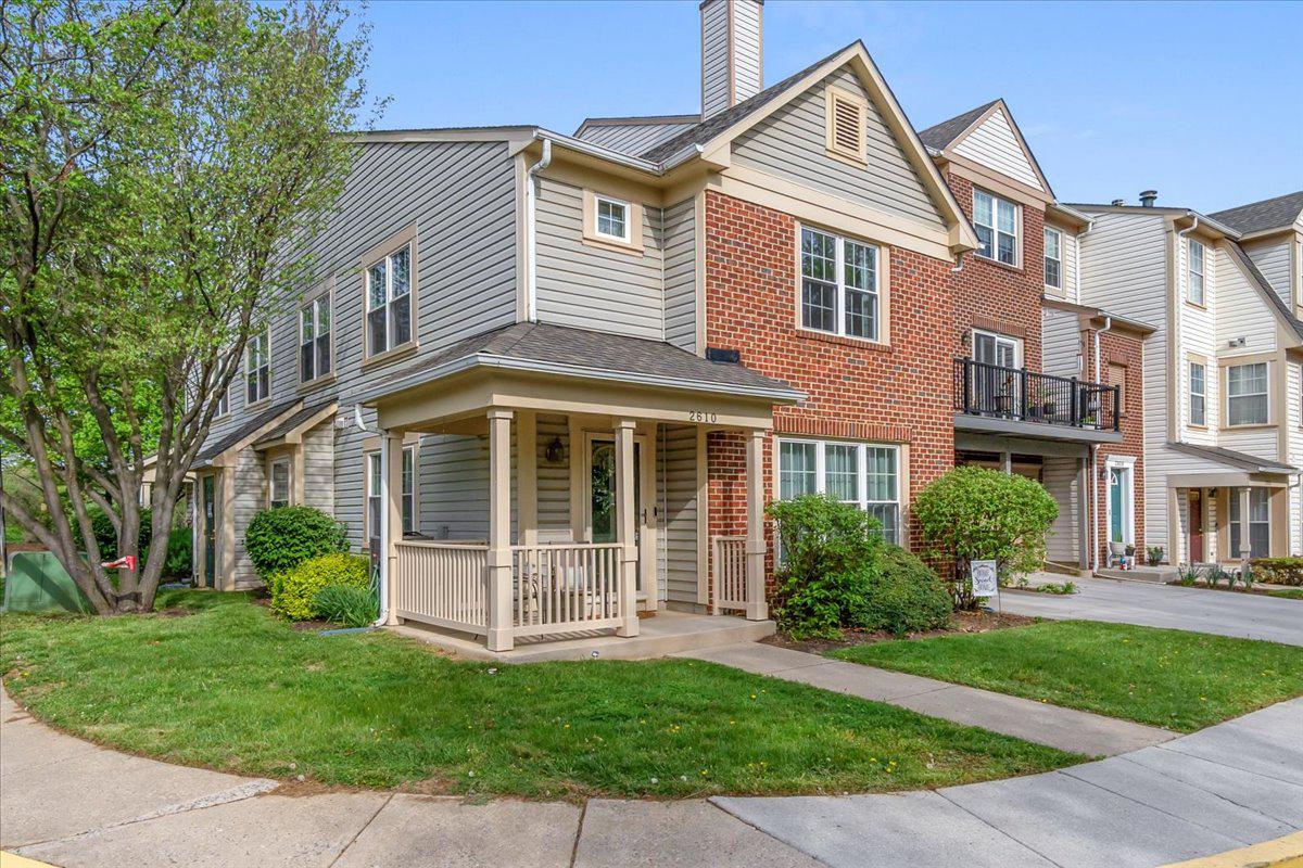2610 Warren Way, Unit 37 Frederick, MD 21701 - Photo 40 of 42 a view of a house with a yard and plants