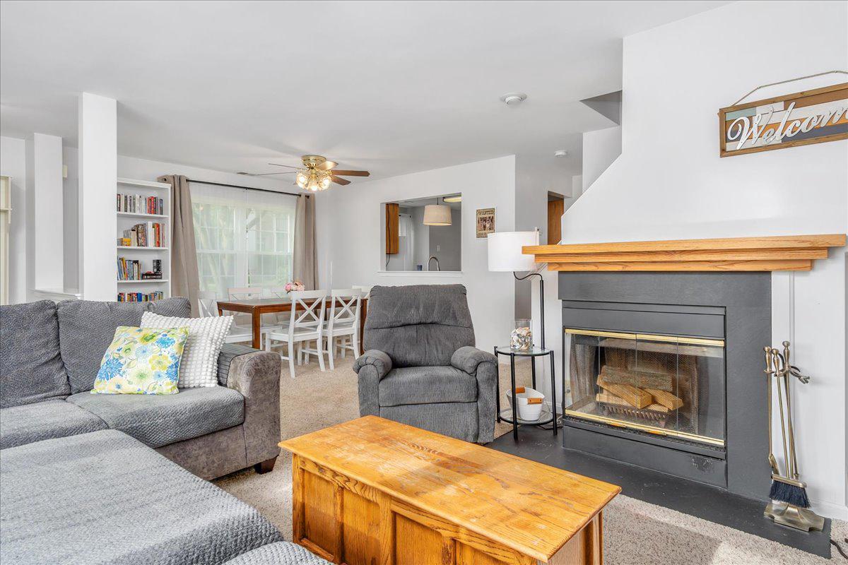 2610 Warren Way, Unit 37 Frederick, MD 21701 - Photo 8 of 42 a living room with furniture and a fireplace
