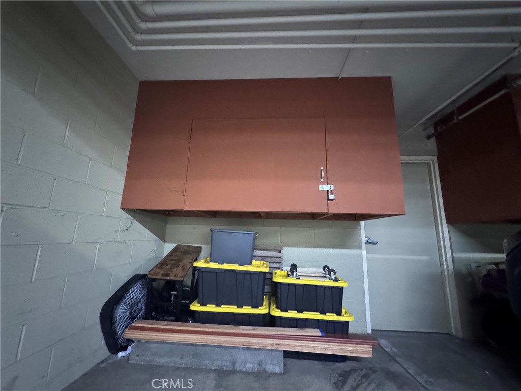 3516 East Ransom Street, Unit 303 Long Beach, CA 90804 - Photo 32 of 32 Built in, locking storage in garage