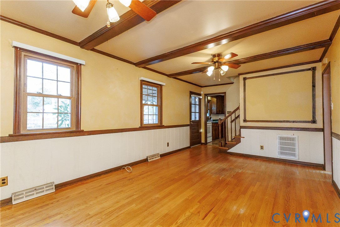 111 Arkwright Road North Chesterfield, VA 23236 - Photo 11 of 24 a view of an empty room with a window and a kitchen