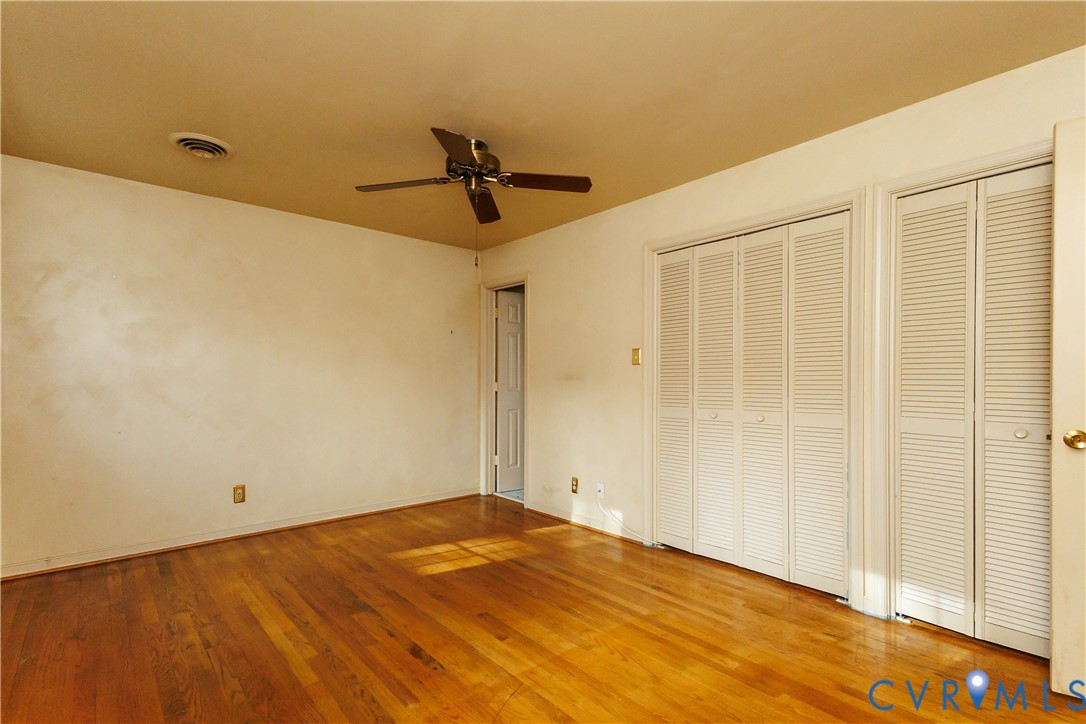 111 Arkwright Road North Chesterfield, VA 23236 - Photo 13 of 24 a view of a big room with wooden floor and windows in a room