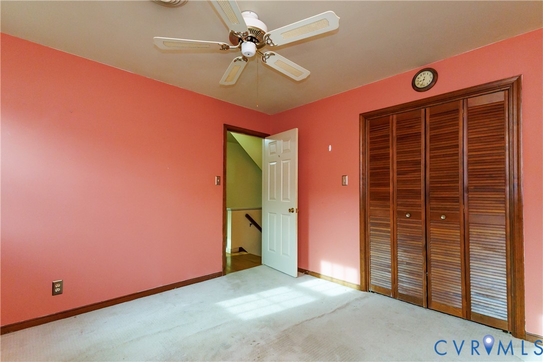 111 Arkwright Road North Chesterfield, VA 23236 - Photo 18 of 24 an empty room with a ceiling fan