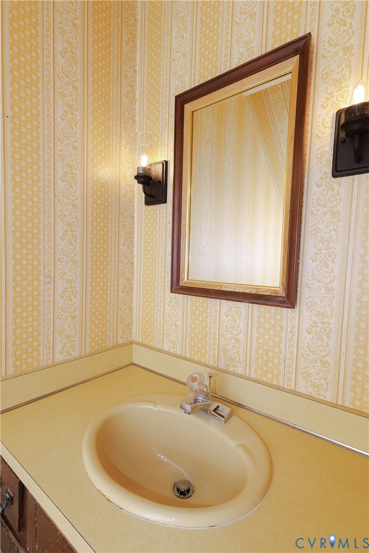 111 Arkwright Road North Chesterfield, VA 23236 - Photo 21 of 24 a bathroom with a sink and a mirror