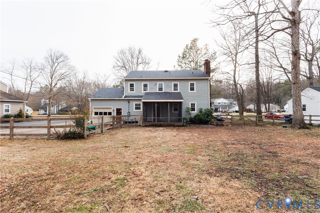 111 Arkwright Road North Chesterfield, VA 23236 - Photo 3 of 24 a view of a house with a yard covered in snow