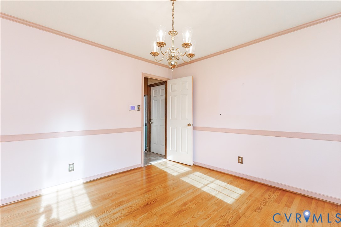 111 Arkwright Road North Chesterfield, VA 23236 - Photo 5 of 24 a view of a chandelier fan and entryway