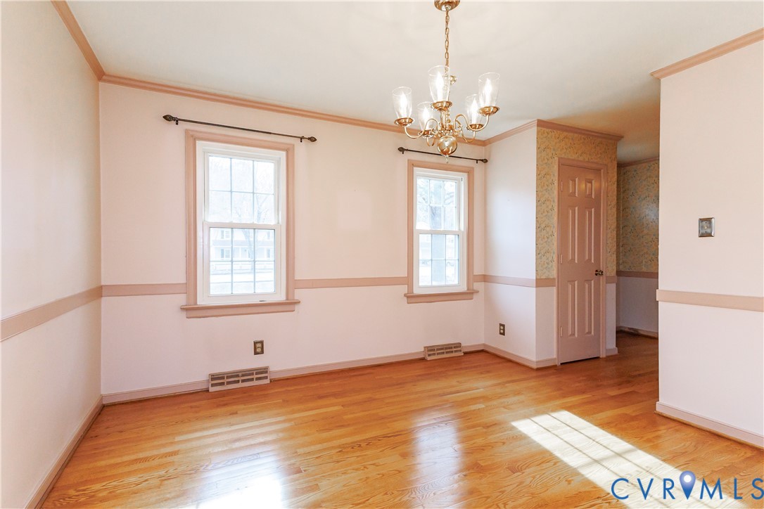 111 Arkwright Road North Chesterfield, VA 23236 - Photo 6 of 24 a view of a livingroom with wooden floor and windows