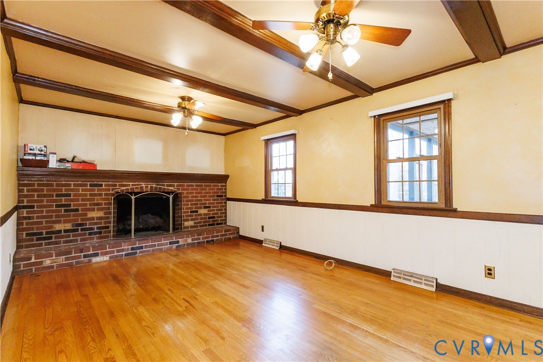111 Arkwright Road North Chesterfield, VA 23236 - Photo 10 of 24 a view of an empty room with a fireplace and a window