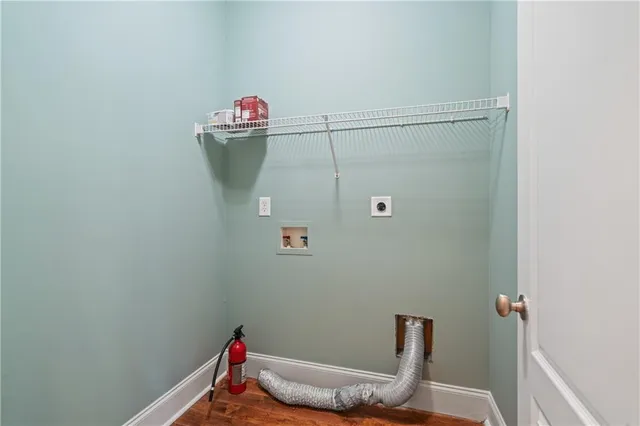 a bathroom with a tub a sink and a shower