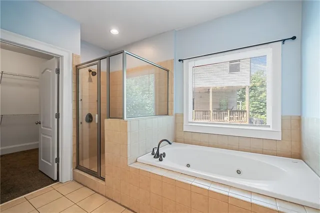 a living room with furniture fireplace and a flat screen tv