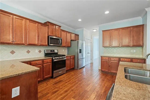 a view of balcony with wooden floor