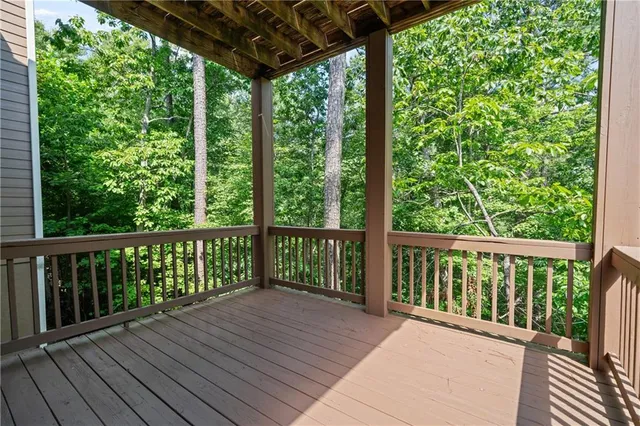 a kitchen with stainless steel appliances granite countertop a refrigerator stove and sink