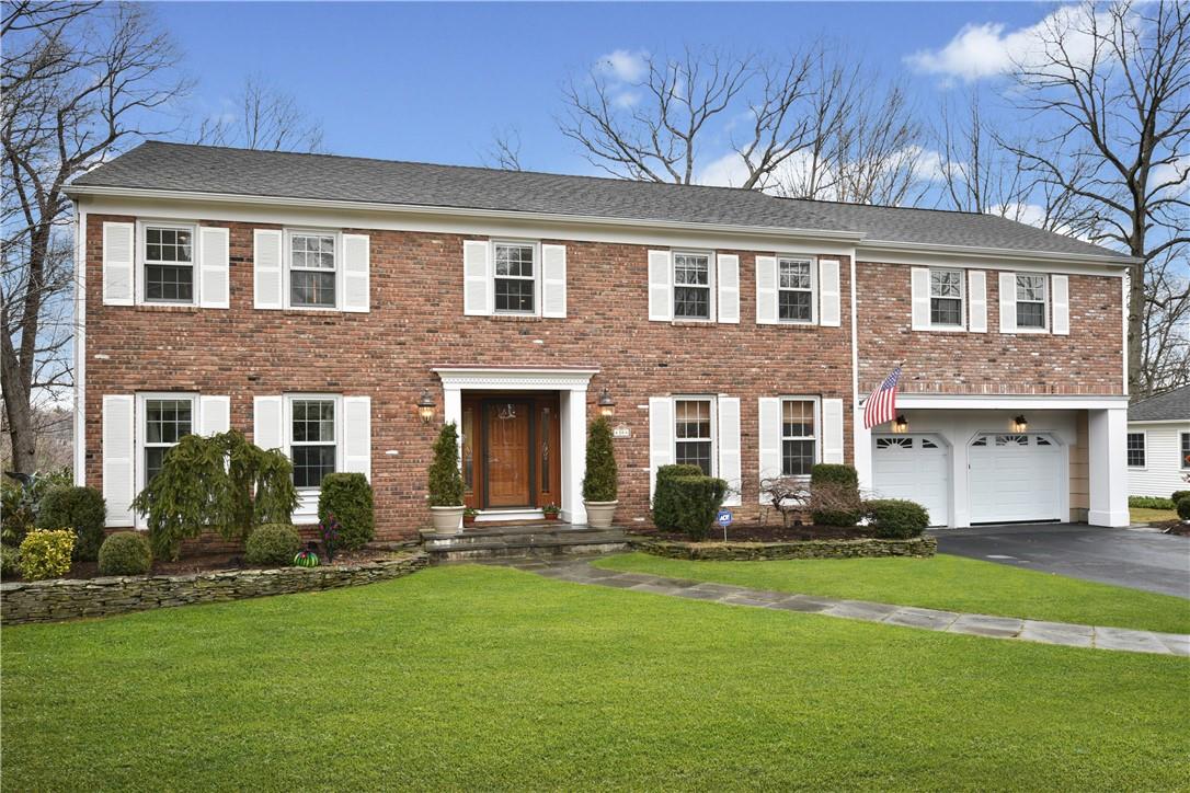 59 Sycamore Road Scarsdale, NY 10583 - Photo 1 of 1 a front view of a house with a yard