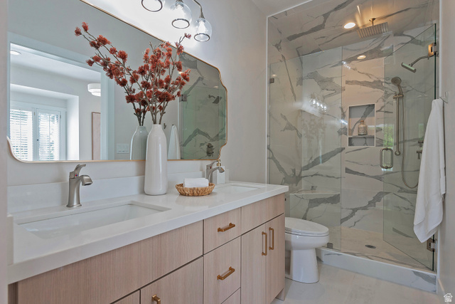 16 Gatehouse Lane Sandy, UT 84092 - Photo 40 of 73 Ensuite Bathroom featuring double vanity and a marble finish shower with 2nd laundry