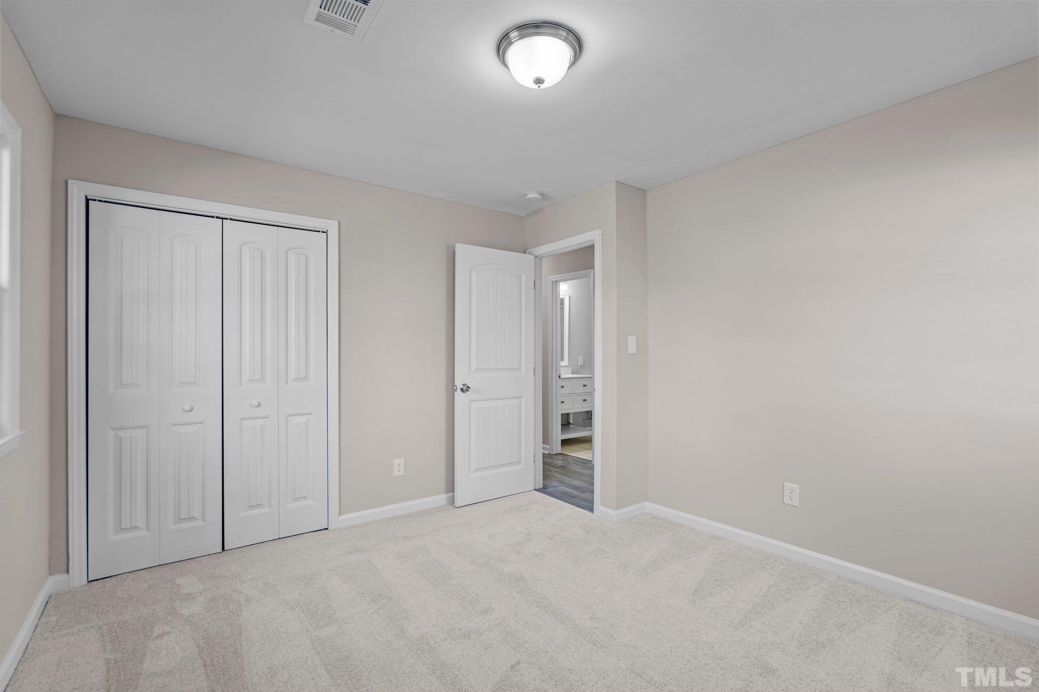 101 Holly Road Castle Hayne, NC 28429 - Photo 18 of 31 an empty room with closet area