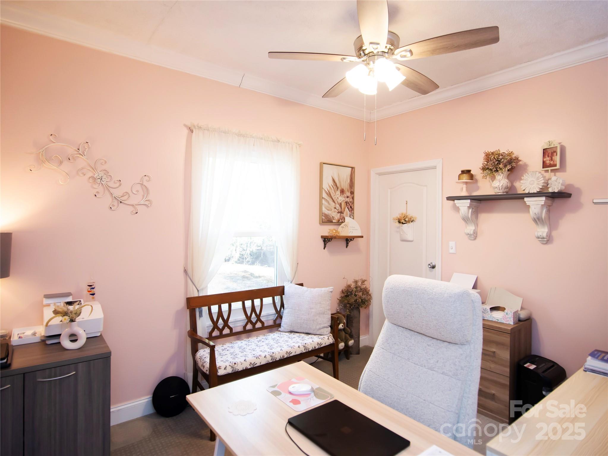 3053 Dalton Drive Morganton, NC 28655 - Photo 30 of 47 a living room with furniture and a chandelier