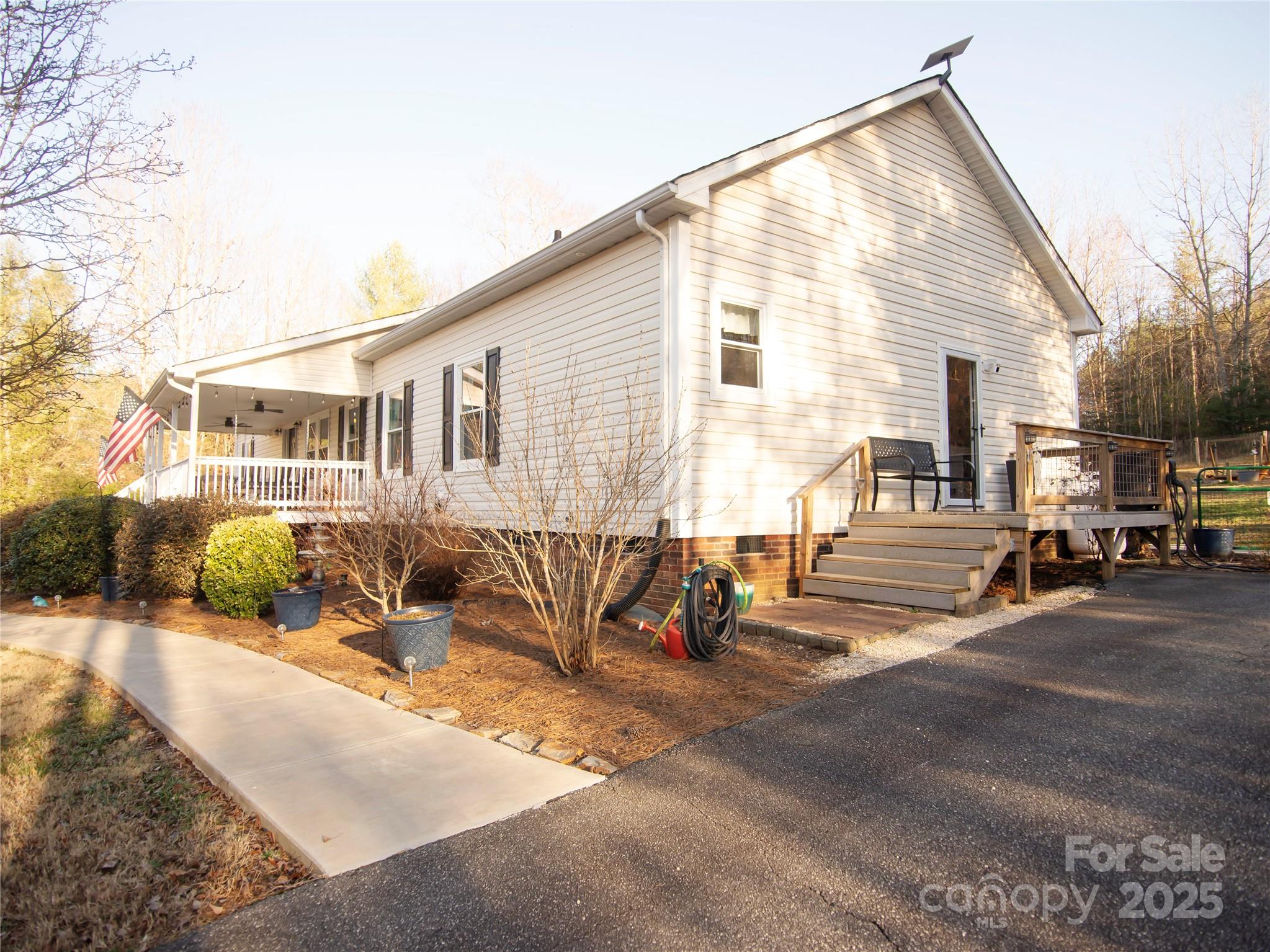 3053 Dalton Drive Morganton, NC 28655 - Photo 39 of 47 a view of a house with a patio