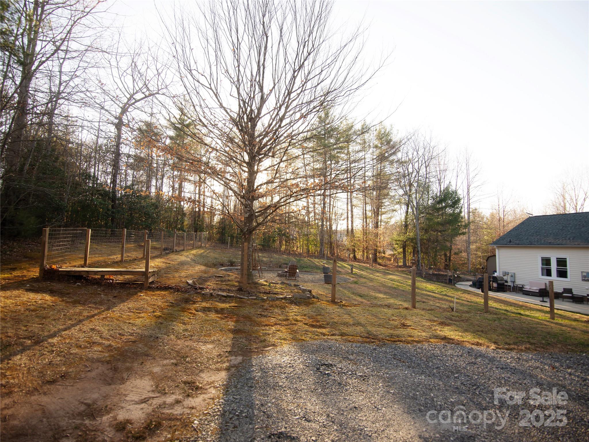 3053 Dalton Drive Morganton, NC 28655 - Photo 41 of 47 a view of a yard with a house