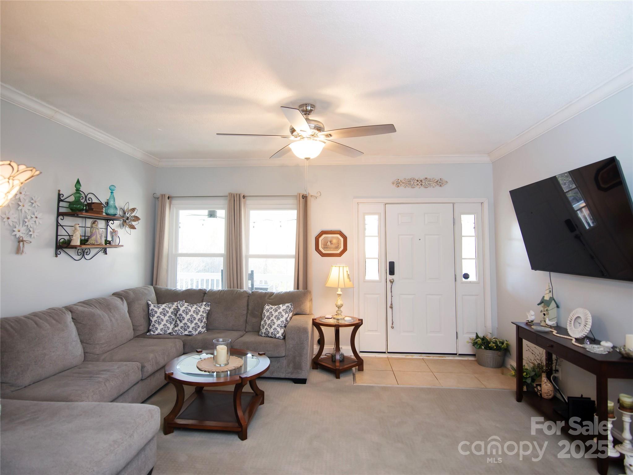 3053 Dalton Drive Morganton, NC 28655 - Photo 6 of 47 a living room with furniture and a flat screen tv