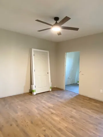 an empty room with fan