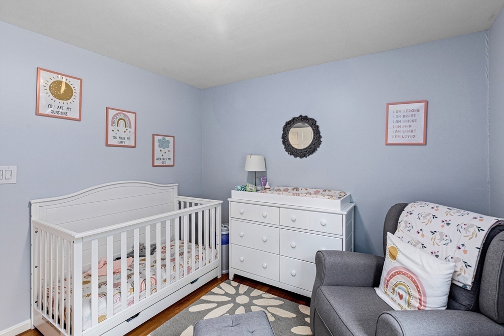 29 Worrall Road Plymouth, MA 02360 - Photo 27 of 38 a bedroom with a baby bed couch and a window