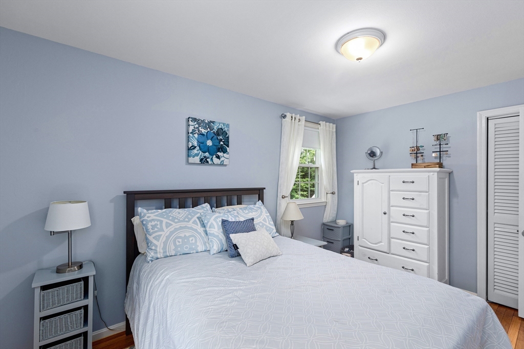 29 Worrall Road Plymouth, MA 02360 - Photo 30 of 38 a bedroom with a bed and a night stand