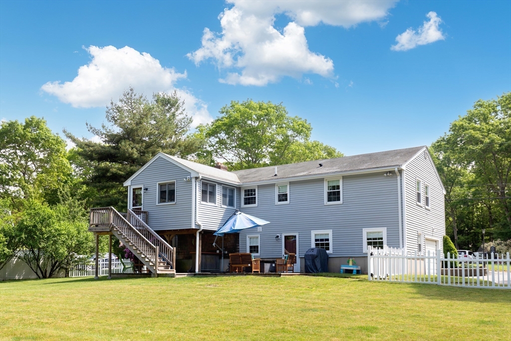 29 Worrall Road Plymouth, MA 02360 - Photo 4 of 38 a view of a house with a swimming pool and a yard