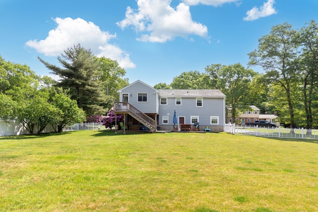29 Worrall Road Plymouth, MA 02360 - Photo 9 of 38 a view of a swimming pool with lawn chairs and a large tree